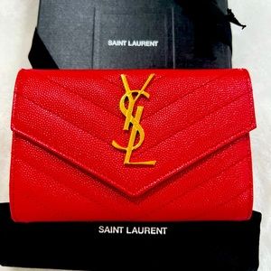 Like new YSL compact wallet. Can wear with gold mini chain as WOC.